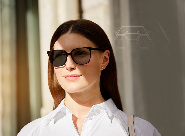 Woman wearing self-tinting ColorMatic 3 Sun lenses